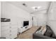 Bright living room with modern furniture, gray sofa, and carpet at 1271 Mackintosh Nw Park # 30, Atlanta, GA 30318