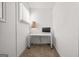 Small carpeted office space with a white desk near the window at 1271 Mackintosh Nw Park # 30, Atlanta, GA 30318