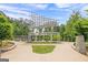 Park structure with landscaping and sidewalk leading to park amenities and green space at 1271 Mackintosh Nw Park # 30, Atlanta, GA 30318