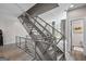 Unique industrial-style staircase design with metal railings and plenty of natural light at 1271 Mackintosh Nw Park # 30, Atlanta, GA 30318