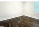 Bedroom featuring hardwood floors, white walls, and natural light at 1914 North Nw Ave, Atlanta, GA 30318
