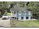 Charming two-story home with blue siding, white trim, and a landscaped yard at 1914 North Nw Ave, Atlanta, GA 30318