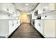 Modern kitchen featuring white cabinetry, stainless steel appliances, and hardwood floors at 1914 North Nw Ave, Atlanta, GA 30318