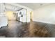 Open-concept living area with hardwood floors, connecting the kitchen and living spaces at 1914 North Nw Ave, Atlanta, GA 30318