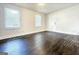 Living room featuring hardwood floors, white walls, and abundant natural light at 1914 North Nw Ave, Atlanta, GA 30318