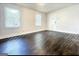 Bright living room featuring hardwood floors, white walls, and abundant natural light at 1914 North Nw Ave, Atlanta, GA 30318