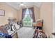 Empty bedroom with large window and vaulted ceiling at 264 Line Creek Cir, Sharpsburg, GA 30277