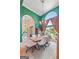 Bright dining room featuring natural light, elegant decor, and wood flooring, perfect for gatherings at 264 Line Creek Cir, Sharpsburg, GA 30277