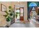 Light-filled foyer with tiled floor, stylish doors, and high ceilings for an open, welcoming atmosphere at 264 Line Creek Cir, Sharpsburg, GA 30277
