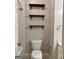 Bathroom with white subway tile shower and rustic wood shelving at 2840 Peachtree Road Nw Nw Rd # 306, Atlanta, GA 30305