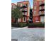 Attractive brick apartment building with balconies and well-maintained landscaping at 2840 Peachtree Road Nw Nw Rd # 306, Atlanta, GA 30305