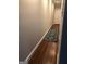 Clean hallway with a hardwood floor and decorative rug at 2840 Peachtree Road Nw Nw Rd # 306, Atlanta, GA 30305