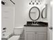 Classic bathroom features a vanity with granite counters and tile shower at 5207 Santa Fe Pkwy, Sandy Springs, GA 30350