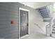 Exterior door with house number next to a stairwell at 5207 Santa Fe Pkwy, Sandy Springs, GA 30350