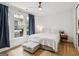 Cozy bedroom with neutral tones, natural light, and hardwood floors at 698 Eustace Se St, Atlanta, GA 30315