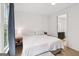 Relaxing bedroom with natural light and ensuite access to the bathroom at 698 Eustace Se St, Atlanta, GA 30315