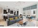 Bright dining area with large windows, comfortable seating, and adjacent fireplace at 698 Eustace Se St, Atlanta, GA 30315