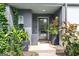 Stylish front entrance with greenery, modern lighting, and a sleek black door with a glass pane at 698 Eustace Se St, Atlanta, GA 30315