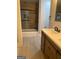 Modern bathroom featuring a walk-in shower with stylish tile and a vanity with double sinks at 1053 Metropolitan Parkway Southwest Sw Pkwy, Atlanta, GA 30310