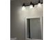 Bathroom mirror and modern lighting at 1053 Metropolitan Parkway Southwest Sw Pkwy, Atlanta, GA 30310