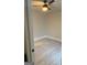 Light and airy bedroom featuring neutral walls, vinyl floors, and a ceiling fan at 1053 Metropolitan Parkway Southwest Sw Pkwy, Atlanta, GA 30310