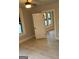 Bedroom with ceiling fan, doorway, and two windows at 1053 Metropolitan Parkway Southwest Sw Pkwy, Atlanta, GA 30310