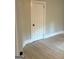 Bedroom with a closed door, trim, and neutral paint at 1053 Metropolitan Parkway Southwest Sw Pkwy, Atlanta, GA 30310