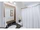 Bathroom featuring a granite vanity and shower with a white curtain at 200 Long Needle Ct, Sugar Hill, GA 30518