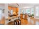 Bright kitchen with granite countertops, stainless steel appliances and a breakfast bar at 200 Long Needle Ct, Sugar Hill, GA 30518