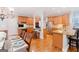 Beautiful kitchen with stainless steel appliances, hardwood floors, and a breakfast bar at 200 Long Needle Ct, Sugar Hill, GA 30518