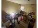Bedroom with an open window, a plant, packed boxes, and assorted items scattered throughout the room at 2009 Oak Park Ln, Decatur, GA 30032