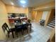 The dining area features a tile floor, a bar and stairs to a second level at 2009 Oak Park Ln, Decatur, GA 30032