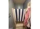Small shower with blue and white towel at 2009 Oak Park Ln, Decatur, GA 30032