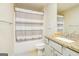Bathroom with a shower over the tub, granite countertop and decorated in neutral colors at 232 Shelton Cir, Temple, GA 30179