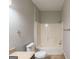 Neutral bathroom featuring a shower-tub combo, granite-look vanity, and tile floor at 5341 Terrytown Ln, Lithonia, GA 30038