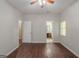 Neutral bedroom with hardwood floors and ceiling fan at 5341 Terrytown Ln, Lithonia, GA 30038