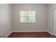 Neutral bedroom with hardwood floors and natural light at 5341 Terrytown Ln, Lithonia, GA 30038
