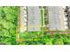 Aerial view highlighting the backyard space behind the townhomes at 711 Topsail Ln, Alpharetta, GA 30005