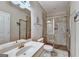 Bathroom featuring tiled walk-in shower and vanity at 711 Topsail Ln, Alpharetta, GA 30005