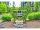 Community entrance sign surrounded by lush landscaping at 711 Topsail Ln, Alpharetta, GA 30005