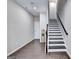 Entryway featuring hardwood floors and stairs leading to the second level at 711 Topsail Ln, Alpharetta, GA 30005