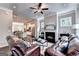 Spacious living room open to a well-appointed kitchen and dining area at 711 Topsail Ln, Alpharetta, GA 30005