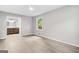 View of a bedroom that leads to a full bathroom and features a window at 2487 Highland Se Dr, Conyers, GA 30013