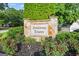 Stone sign for Fieldstone Estates surrounded by well-maintained landscaping at 2487 Highland Se Dr, Conyers, GA 30013