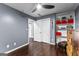 Bedroom with hardwood floors, closet and built-in shelves for extra storage at 435 Hampton Grn, Peachtree City, GA 30269