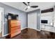 Bedroom with hardwood floors, television and closet for storage at 435 Hampton Grn, Peachtree City, GA 30269