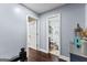 Upstairs hallway with access to a bathroom at 435 Hampton Grn, Peachtree City, GA 30269