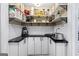 Organized pantry with ample shelving, white cabinets, and black countertop offering plenty of storage space at 435 Hampton Grn, Peachtree City, GA 30269