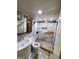 This bathroom features a unique vanity, toilet, and glass shower with custom tile work at 620 Ne Peachtree Street # 901, Atlanta, GA 30308