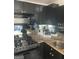 Kitchen with stainless appliances and granite countertops at 620 Ne Peachtree Street # 901, Atlanta, GA 30308
